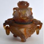 A LATE 19TH CENTURY CHINESE CARVED AGATE KORO AND COVER with twin mask head ring hanles and carved