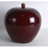 A CHINESE QING DYNASTY FLAMBE GLAZED GINGER JAR AND COVER with circular finial. 9.5ins high.