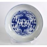 A CHINESE BLUE AND WHITE PORCELAIN SAUCERDISH bearing Qianlong marks to base, painted with phoenix