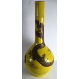 A VERY LARGE 19TH CENTURY CHINESE YELLOW GROUND VASE decorated in relief with a brown glazed dragon.