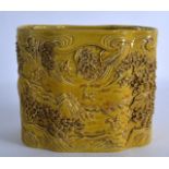 AN UNUSUAL CHINESE YELLOW GLAZED PORCELAIN BRUSH POT bearing Daoguang marks to base, carved in