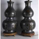 A PAIR OF EARLY 20TH CENTURY CHINESE DOUBLE GOURD PEWTER AND COPPER VASES converted to lamps. Vase