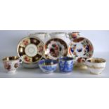 A WOLFE MASON BLUE AND WHITE GILT TRIO together with a London shape imari cup & saucers possibly