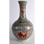 A 19TH CENTURY CHINESE FAMILLE ROSE BULBOUS VASE bearing Qianlong marks to base, painted with