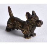 A SMALL AUSTRIAN BRONZE FIGURE OF A DOG. 1Ins wide.