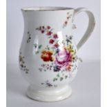 AN 18TH CENTURY DERBY SILVER SHAPED MUG painted with flowers. 4Ins high.