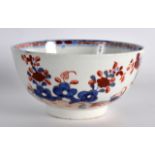 AN 18TH CENTURY LOWESTOFT BOWL painted with the Two bird pattern. 4.25ins diameter.