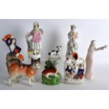 AN UNUSUAL 19TH CENTURY STAFFORDSHIRE FIGURAL GROUP together with other figures. (7)