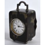 AN EDWARDIAN SILVER MOUNTED TORTOISESHELL CARRIAGE CLOCK by Elliott & Sons of London. 4.25ins high