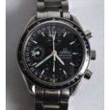 A GOOD OMEGA MENS CHRONOGRAPH SPEEDMASTER AUTOMATIC STEEL WRISTWATCH with outer sleeve box and spare