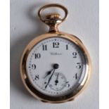 A 9CT GOLD WALTHAM POCKET WATCH with separate seconds dial. 32.6 grams.