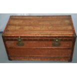 AN ANTIQUE FRENCH LEATHER AND BRASS BOUND TRUNK by Moynat of Paris. 2ft 11ins wide.