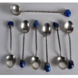 A SET OF SEVEN SOUTH AMERICAN SILVER AND LAPIS LAZULI SPOONS. Stamped 900. (7)