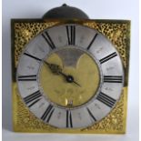 AN 18TH CENTURY BRASS CLOCK MOVEMENT by James Brock of Axbridge. 11Ins square.