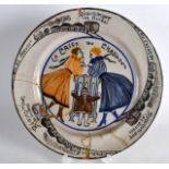 A RARE FRENCH QUIMPER FAIENCE POTTERY WW1 PLATE depicting an evacuee flanked by trains and two other