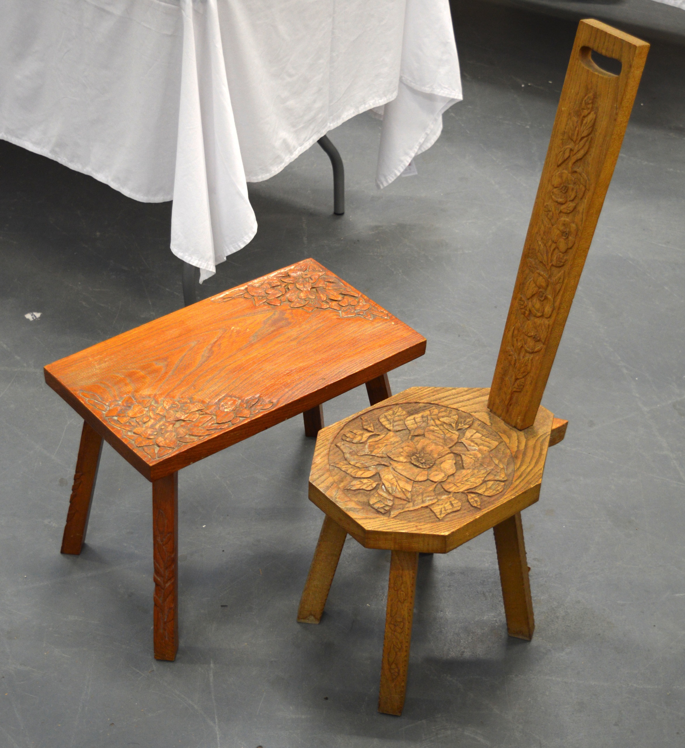 A CARVED EASTERN CHAIR, together with an occasional table.