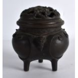 A 19TH CENTURY JAPANESE MEIJI PERIOD BRONZE CENSER AND COVER with mythical mask heads, the pierced