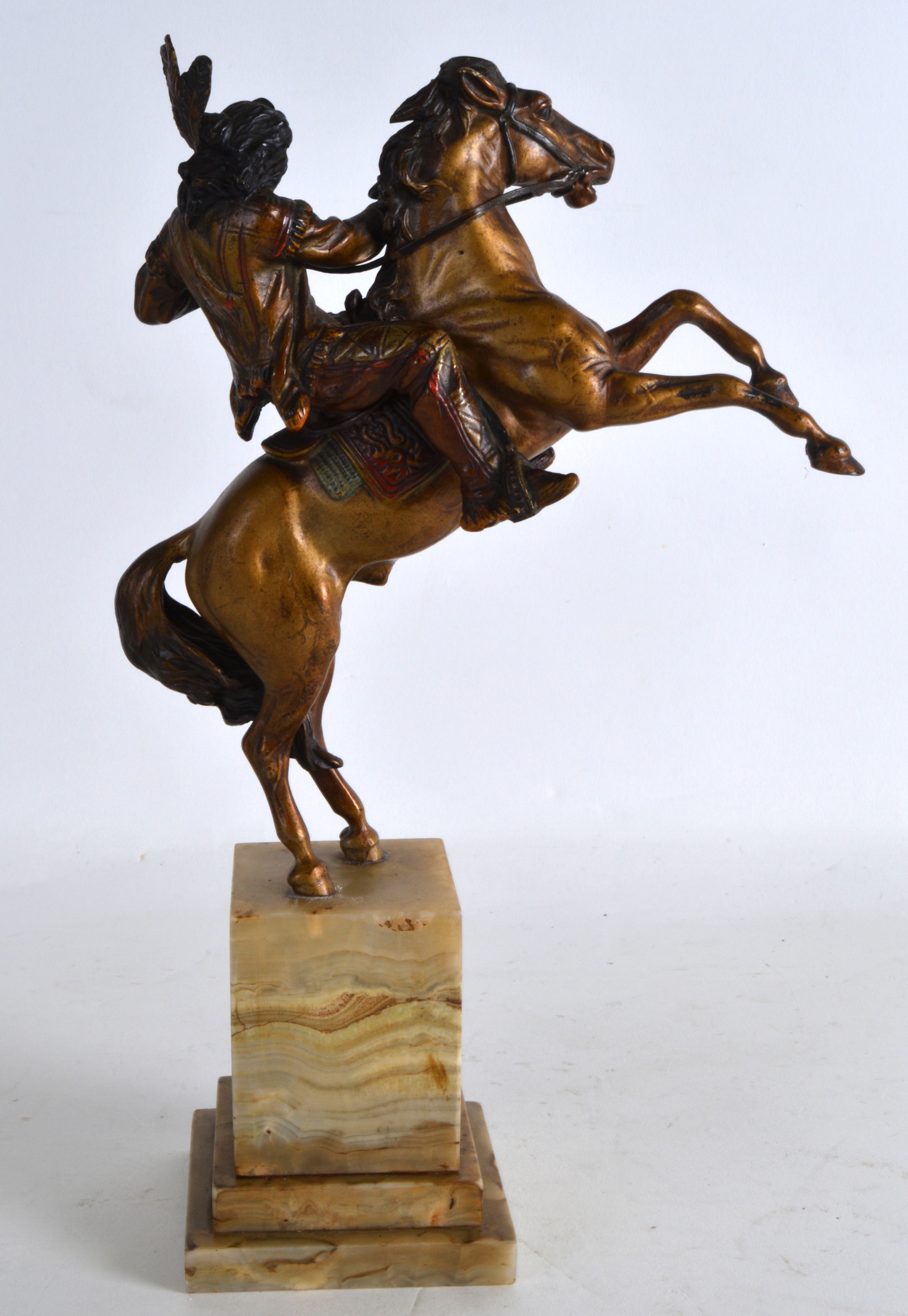 A LATE 19TH CENTURY AUSTRIAN COLD PAINTED BRONZE FIGURE OF A NATIVE AMERICAN modelled upon a rearing - Image 2 of 2