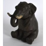 AN UNUSUAL LATE 19TH CENTURY SPELTER INKWELL in the form of a recumbant elephant. 5.5ins high.