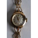 A 9CT GOLD LADIES ACCURIST WRISTWATCH. 12 grams.