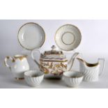 A 19TH CENTURY PARIS PORCELAIN TEAPOT AND COVER together with a Sevres style cream jug etc. (7)