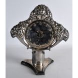 AN EARLY 20TH CENTURY FRENCH ART NOUVEAU SILVER PLATED MANTEL CLOCK decorated in relief with