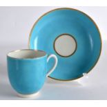 AN 18TH CENTURY WORCESTER COFFEE CUP AND SAUCER painted with a turquoise ground by James Giles.