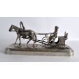 A LOVELY RUSSIAN SILVER FIGURE OF OF A MALE UPON A SLEDGE by Ivan Vonifatiyevich Yevsyigneyev