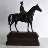 A GOOD 19TH CENTURY EUROPEAN BRONZE FIGURE OF A MALE ON HORSEBACK bearing Spanish inscription to the