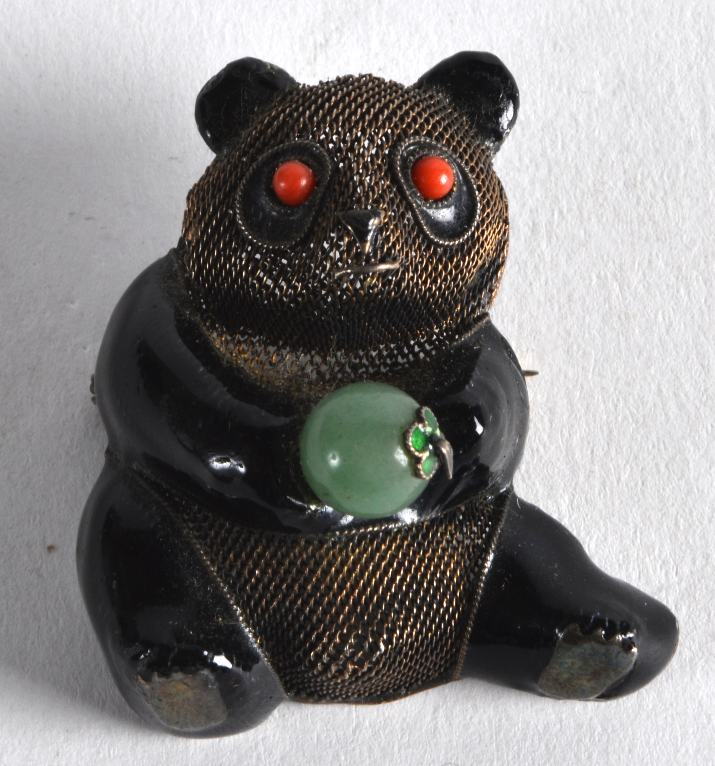 AN EARLY 20TH CENTURY CHINESE SILVER AND ENAMEL PANDA BROOCH with coral and jadeite mounts. 1.5ins