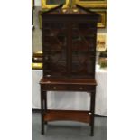 AN EARLY 20TH CENTURY CHINESE CHIPPENDALE STYLE MAHOGANY CABINET. 5 ft 10ins high.