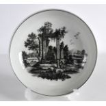 AN 18TH CENTURY WORCESTER SAUCERDISH printed with two men beside a columned folly. 5.25ins