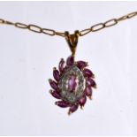 A 9CT YELLOW GOLD DIAMOND AND PINK SAPPHIRE NECKLACE. 3 grams.