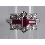 A 9CT RUBY AND DIAMOND DECO STYLE RING.