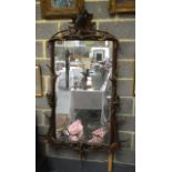 A LOVELY LARGE LATE 19TH CENTURY BAVARIAN CARVED BLACK FOREST WALL MIRROR formed with a deer and