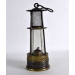 A FRENCH ASHILLE ANDRE BREVETE ALA BOUVERIE MINERS OIL LAMP. 9.75ins high.