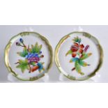 A PAIR OF HEREND PORCELAIN DISHES decorated with fruit. 4Ins diameter.