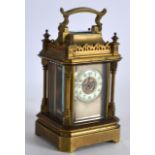 A SMALL LATE 19TH CENTURY FRENCH MINIATURE CARRIAGE CLOCK with pierced frieze, the dial painted with