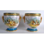 A PAIR OF LATE 19TH CENTURY PARIS PORCELAIN CACHE POTS painted with chickens within landscapes,