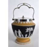 AN UNUSUAL WEDGWOOD TWO TONE JASPERWARE BISCUIT BARREL decorated with classical figures. 9.5ins