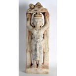 A 19TH CENTURY INDIAN CARVED MARBLE FIGURAL GROUP depicting a deity with hands raised. 1Ft 7.5ins