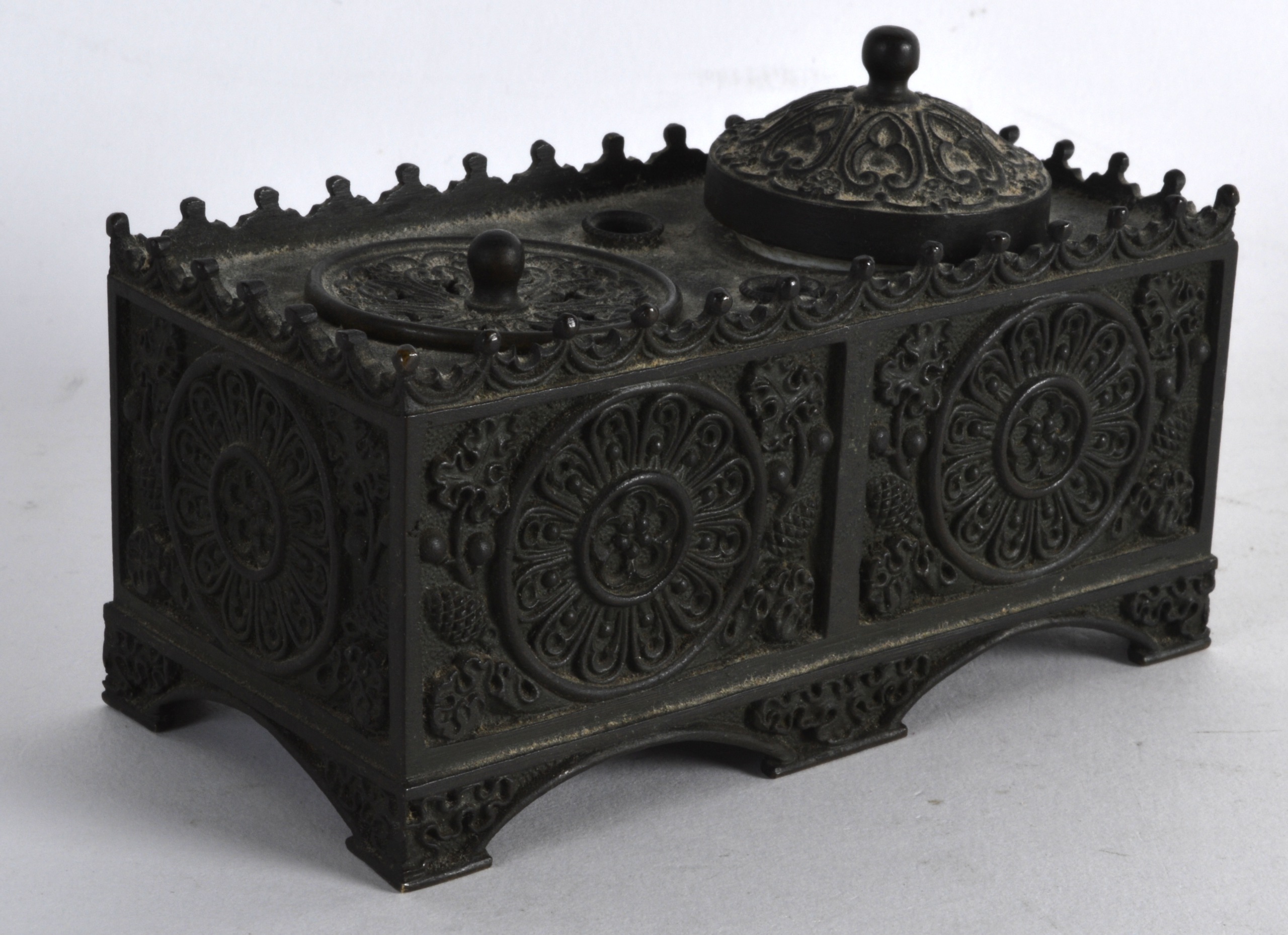 A 19TH CENTURY FRENCH EMPIRE STYLE RECTANGULAR INKWELL decorated with floral motifs. 4.25ins wide.