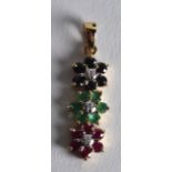 A 9CT EMERALD RUBY AND DIAMOND DROP PENDANT.