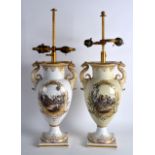 A PAIR OF 19TH CENTURY CONTINENTAL TWIN HANDLED PORCELAIN VASES painted with panels of figures in