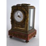 A GOOD LATE 19TH CENTURY FRENCH BRONZE AND MARBLE CARRIAGE CLOCK the dial painted with floral swags.