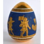 A GOOD RUSSIAN PORCELAIN EASTER EGG decorated with classical putti upon a blue and gilt ground. 3.