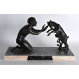 A FRENCH ART DECO SPELTER FIGURAL GROUP depicting a female and a jumping ram. 1Ft 5ins wide.