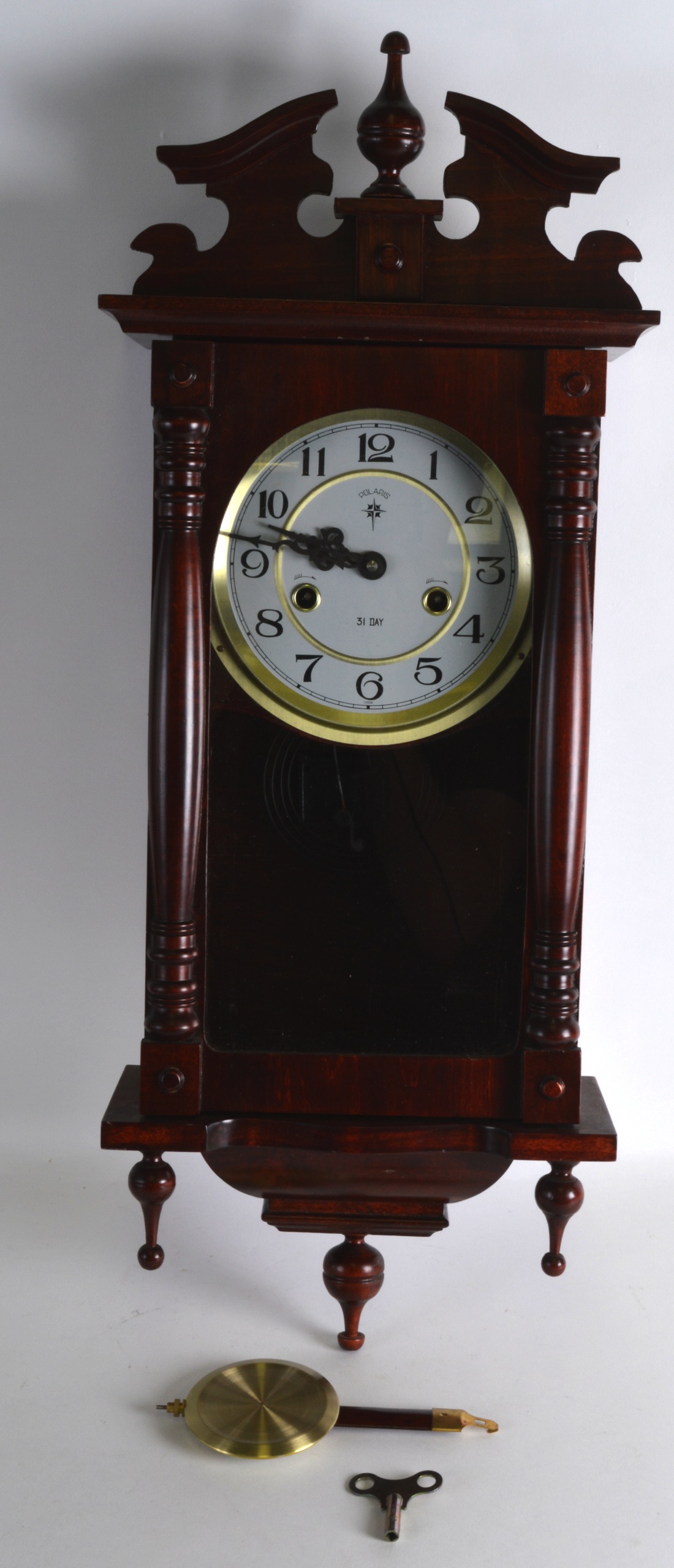 A MONTH DURATION VICTORIAN STYLE STRIKING WALL CLOCK. 2Ft 4ins high.