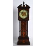 A LATE 19TH CENTURY ROSEWOOD INLAID APPRENTICE TYPE LONGCASE CLOCK decorated with urns of foliage.