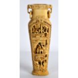 A 19TH CENTURY CHINESE CARVED CANTON IVORY TWIN HANDLED VASE formed with panels of figures in